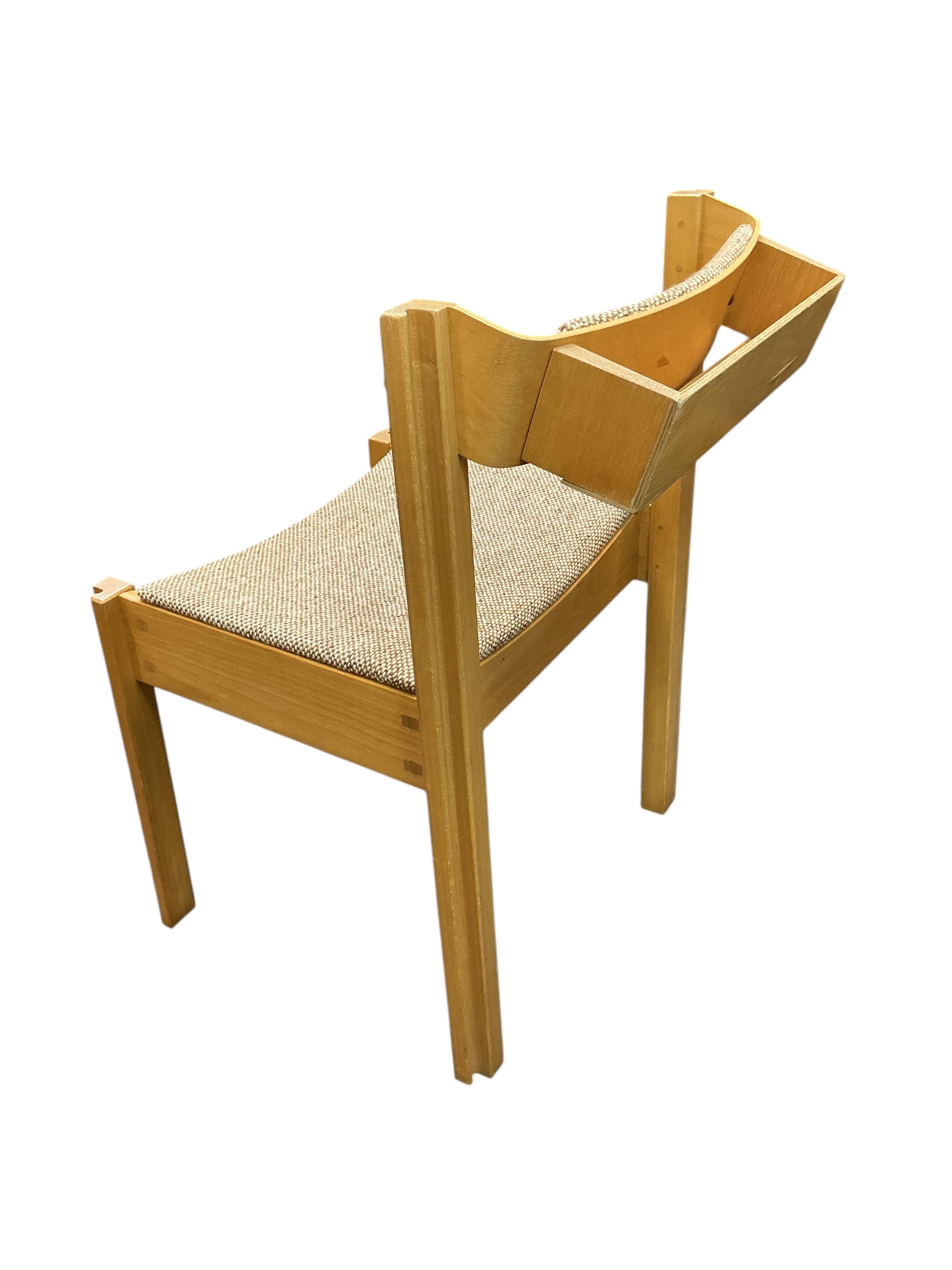 A set of six upholstered Clive Bacon linking chairs